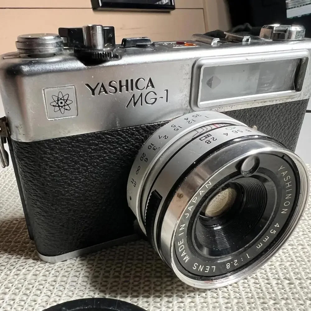 Yashica MG-1 35mm Rangefinder Film Camera 45mm f/2.8 Lens Made‎ in Hong Kong Cap